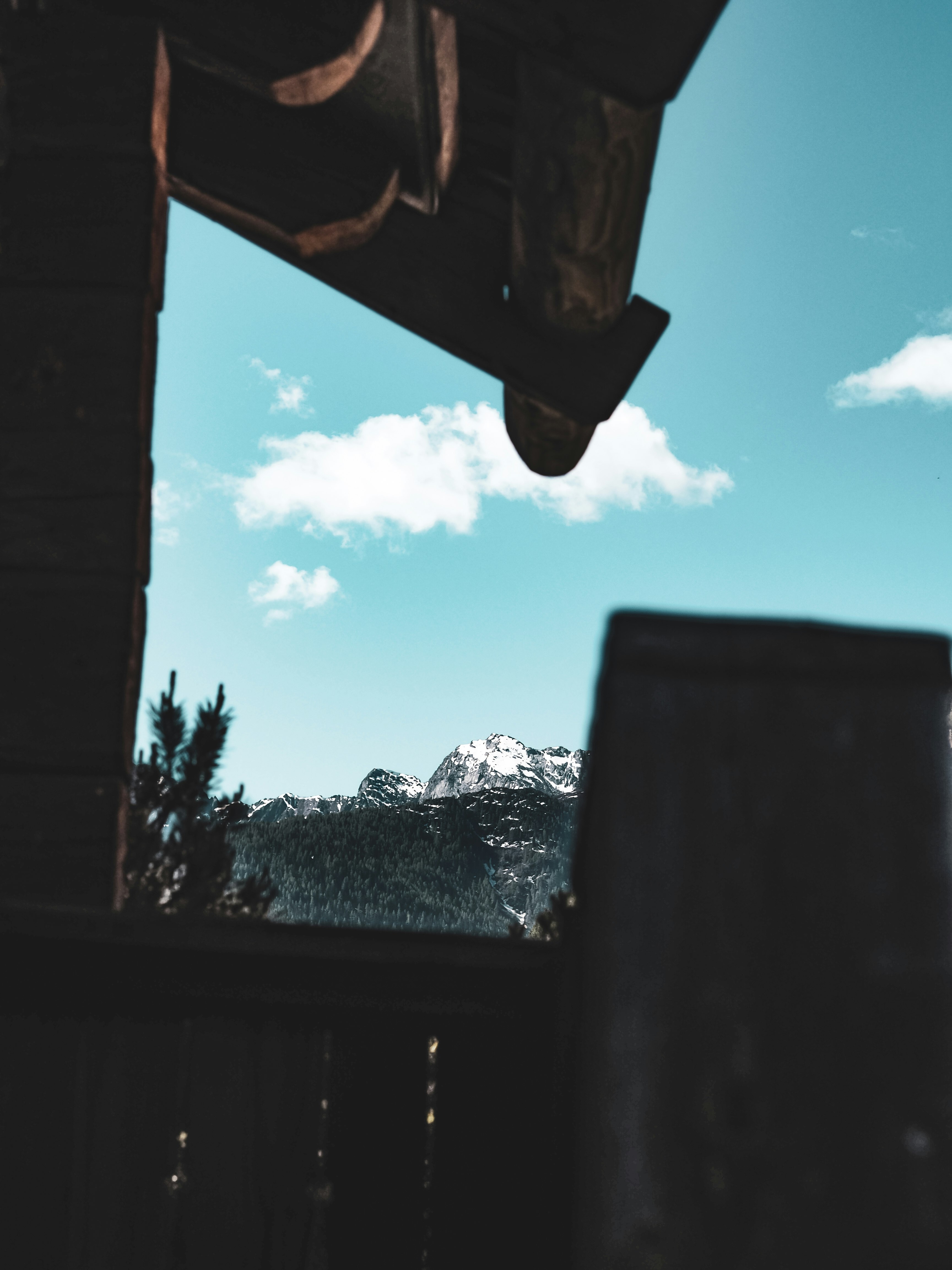 snow covered mountain under blue sky during daytime